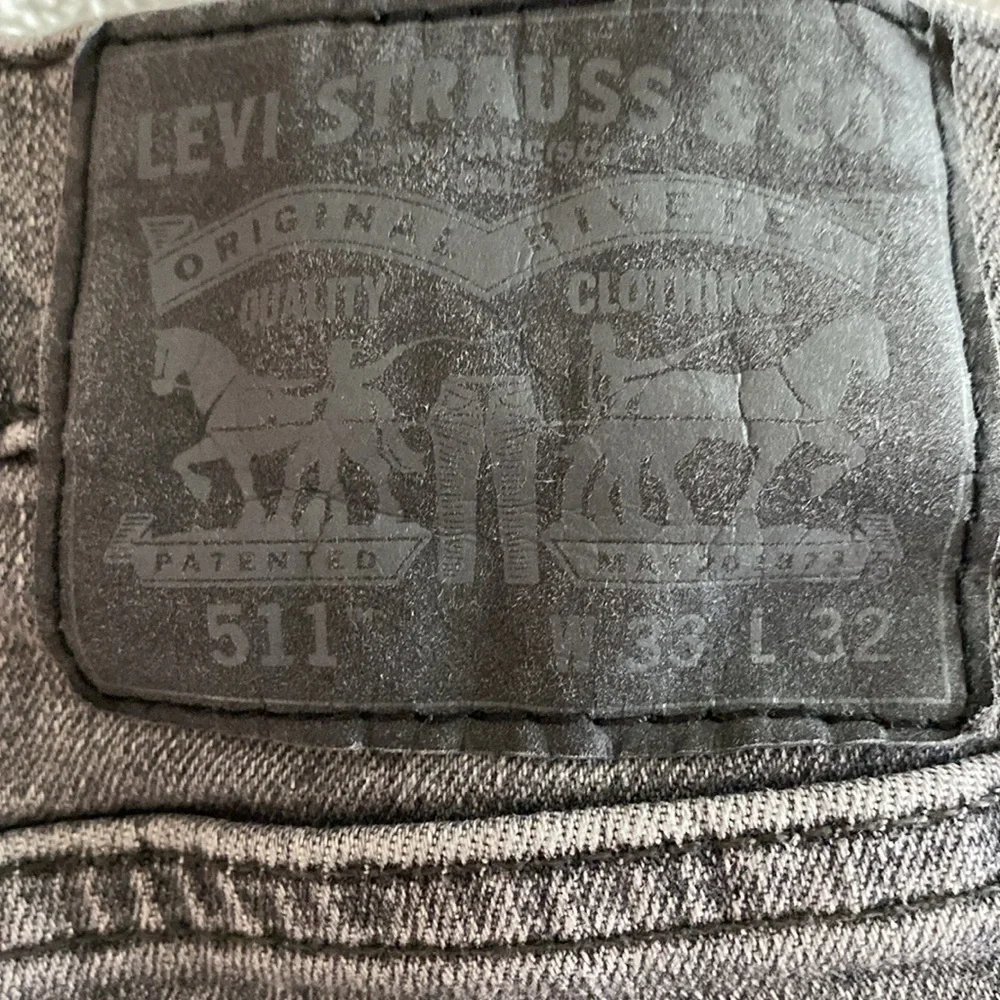 Levi’s 511 grey size 33/32 straight leg EUC